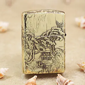 KZ162-01 Gold engraved lighter with a detailed landscape scene of trees, a pavilion, and a boat on a river in relief artwork.