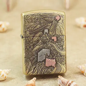 Brass Zippo lighter with an intricate engraving of the Great Wall winding over mountains.