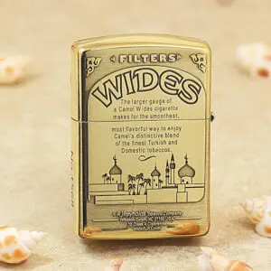 KZ242-01 Gold Zippo-style lighter with 'WIDES' branding and a skyline illustration on the front, resembling a mosque and palm trees.