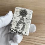 Guanyin portrait and Dharma wheel on the hammered sterling silver Armor case