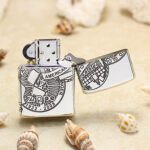 Open reverse view showing the Zippo globe heritage design and engraved lid