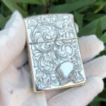 Straight reverse view of the arabesque woman sterling silver Zippo Armor lighter