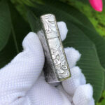 Opposite side engraving on the dragon and phoenix sterling silver Zippo Armor lighter