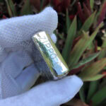 Polished Zippo-marked top edge of the Arabesque Cross sterling silver lighter