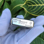 Sterling silver and Armor bottom stamp on the Arabesque Cross Zippo lighter