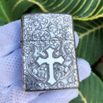Arabesque Cross sterling silver Zippo Armor lighter, alternate front angle