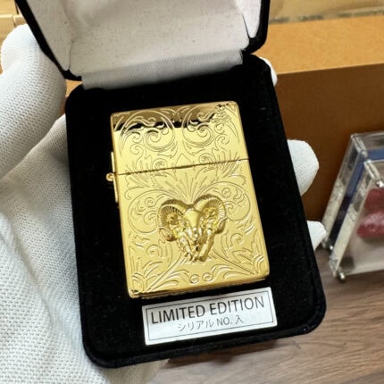 Gold-tone sheep emblem Zippo in a black Limited Edition presentation box