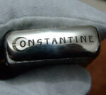 Base of sterling silver Zippo engraved with Constantine lettering