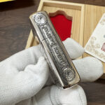 Game of Thrones five-side sterling silver Zippo lighter – narrow-side view with house words and circular symbols