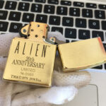 H.R. Giger Alien Anniversary Zippo lighter biomechanical engraving detail