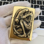 H.R. Giger Alien Anniversary brass Zippo lighter reverse artwork