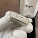 Close-up of the Zippo #27 sterling silver and Armor base marking