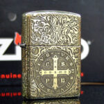 KZ250 Zippo Armor brass St Benedict cross front angle