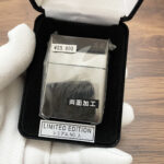 Black Ice dragon Zippo in a protective sleeve and black Limited Edition box