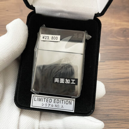 Black Ice dragon Zippo in a protective sleeve and black Limited Edition box