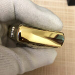Alien Emblem No. 2 brass Zippo lighter skeletal engraving detail