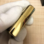 Open H.R. Giger Alien Emblem No. 2 brass Zippo lighter