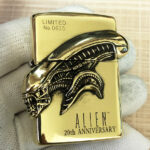 H.R. Giger Alien Emblem No. 3 high-polish brass Zippo lighter front view