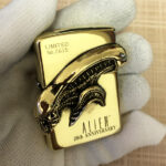 Alien Emblem No. 3 brass Zippo lighter biomechanical engraving detail