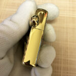 Open Alien Emblem No. 3 brass Zippo lighter reverse view