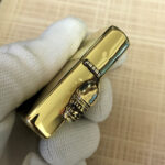 Alien Emblem No. 3 Zippo lighter base stamp close-up