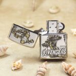 KZ130 Avengers engraved Zippo Armor lighter open, showing Iron Man artwork and lid design