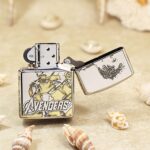 KZ130 Avengers engraved Zippo Armor lighter open, showing Tony Stark portrait and case artwork