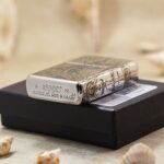 KZ130 Zippo Armor lighter bottom stamp beside its original black Armor Case box