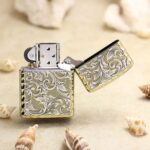 Open KZ131 chrome Zippo Armor lighter showing the arabesque reverse pattern