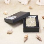 KZ131 Windy pin-up arabesque Zippo Armor lighter displayed in its original box