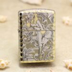 Vintage Windy pin-up framed by arabesque engraving on chrome Zippo Armor lighter