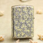 Full arabesque leaf-and-vine engraving on the reverse of KZ133 Zippo Armor lighter