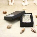 KZ133 numbered arabesque Zippo Armor lighter displayed in its original box