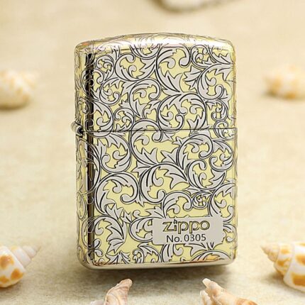 Silver-and-gold arabesque Zippo Armor lighter with numbered No. 0305 front plaque