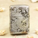 Second phoenix with flowing feathers engraved on the reverse of KZ143 lighter
