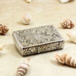 Chinese phoenix floral engraved Zippo Armor lighter lying flat