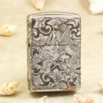 Chinese phoenix and floral scrollwork engraved on polished chrome Zippo Armor lighter