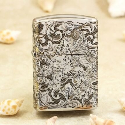 Chinese phoenix and floral scrollwork engraved on polished chrome Zippo Armor lighter