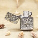 Open White Tara Zippo Armor lighter showing the deity and lotus front engraving