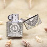 Open KZ144 Zippo Armor lighter showing the Om mandala reverse artwork