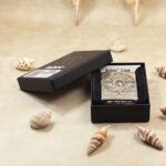 KZ144 White Tara Om mandala Zippo Armor lighter displayed in its original box
