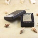 KZ145 guardian angel Zippo Armor lighter displayed in its original Armor Case box