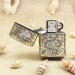 Open Chinese dragon Zippo Armor lighter showing front engraving and lid details
