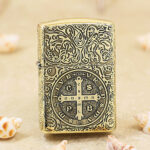 Front view of high-polish brass Zippo Armor with St. Benedict cross engraving