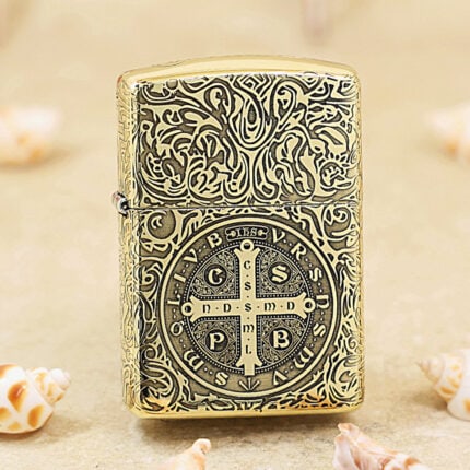 Front view of high-polish brass Zippo Armor with St. Benedict cross engraving