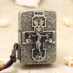 Front view of antique brass Zippo 1941 Replica with raised crucifix relief