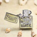 Open KZ151 Zippo Armor lighter showing the Wides camel tobacco-pack front