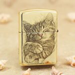 Sleeping kitten with pink nose engraved on the reverse of KZ152 Zippo Armor lighter