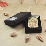 KZ156 twin mermaid ocean Zippo Armor lighter displayed in its original box