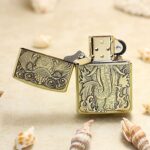 Open elephant Zippo Armor lighter showing the front animal and cloud engraving